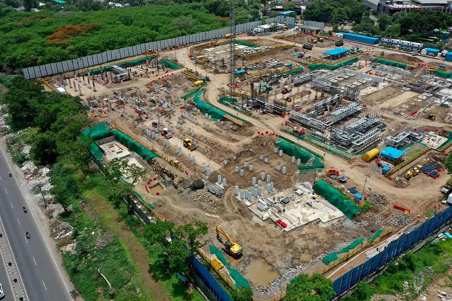 Aerial view, Jun 2024. Monsoon. Structure climbing.