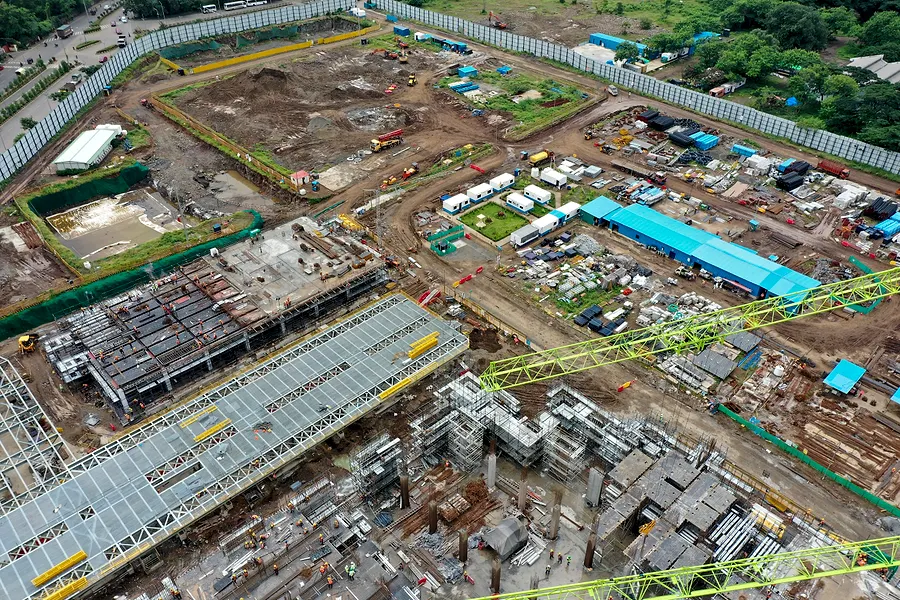 Aerial view, Late Aug. Structure enclosed to upper levels.