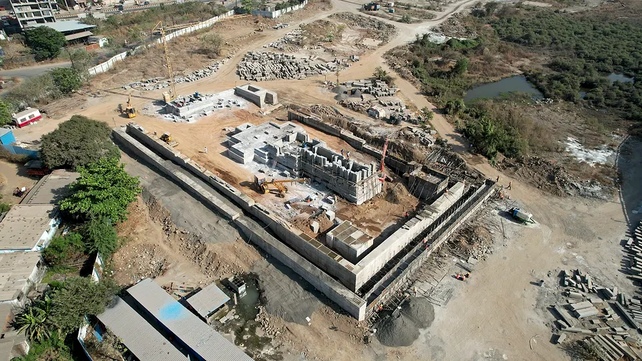 Aerial view, Mar 2025. Boundary wall up. Foundations start.